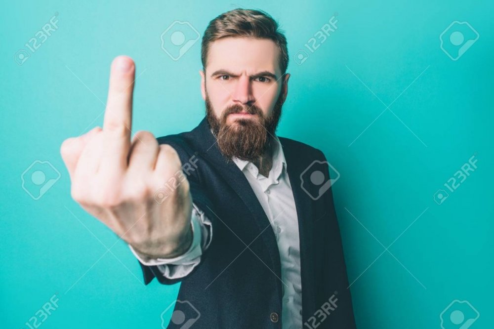 119512149-brutal-man-is-showing-the-middle-finger-to-the-camera-he-is-very-serious-and-angry-he-is-expressing-.jpg